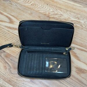 Michael Kors Black Zip-Around Wallet with Gold Details and Wrist Strap